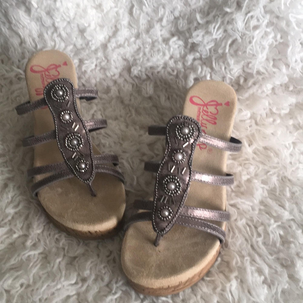 Cute strappy wedges.
